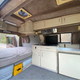 Image for article titled This Ford E-250 Sportsmobile Will Take You Camping Where Other RVs Can't